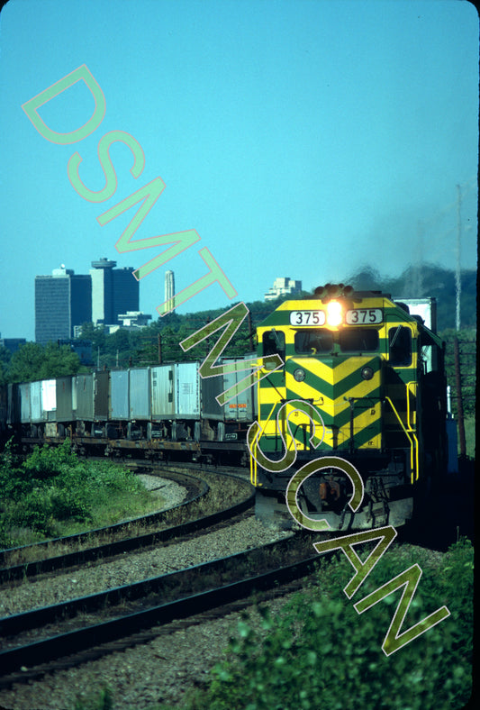 Original Kodachrome Slide, MKT GP39-2 375 lead the southbound Texas Special at Kansas City, KS, with Downtown Kansas CIty, MO in the background.