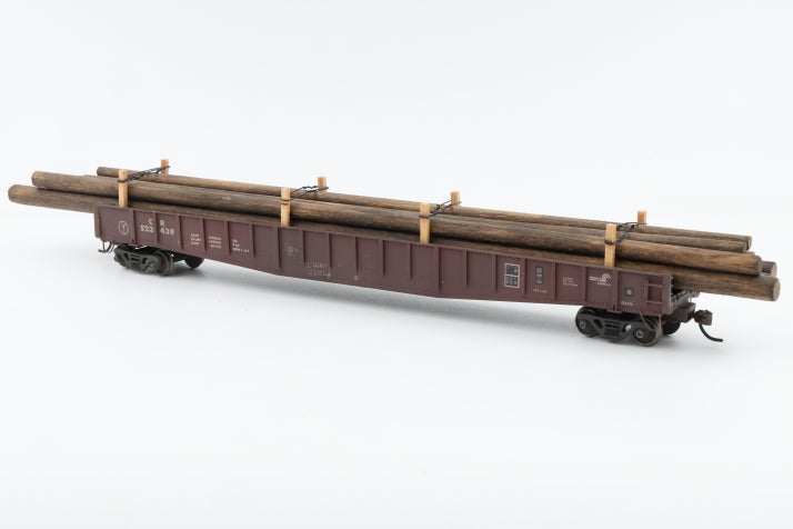 Conrail 523439 HO scale 65' Mill Gondola with drop ends and custom build wood pole load, nicely weathered.